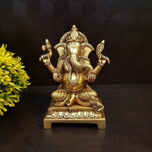 Brass Ganesha on base with yellow finish pooja items hindu god idols home decor gift buy online coimbatore