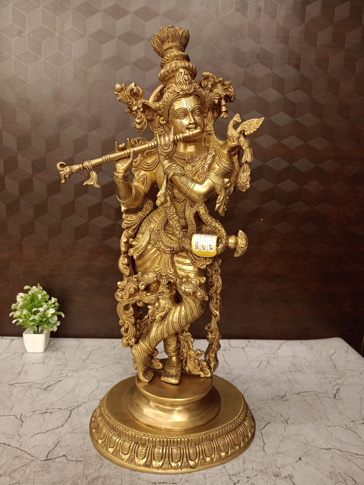 brass krishna idol