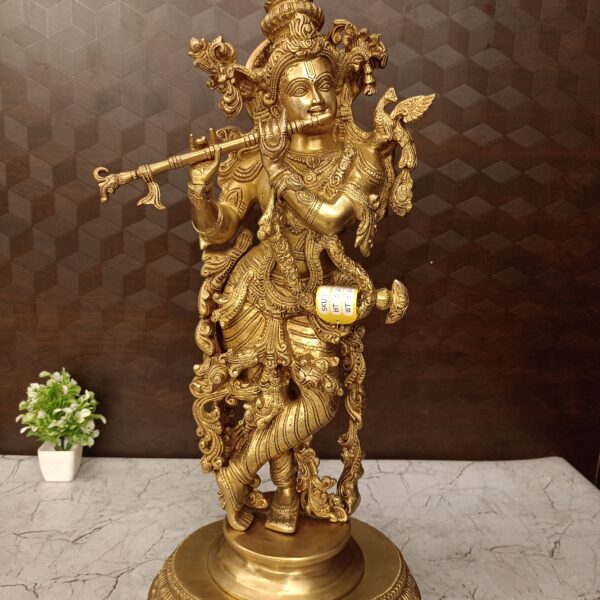 brass krishna idol