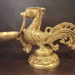 Brass Peacock Holding Diya , Pure & Antique