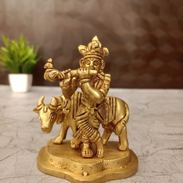 Brass cow krishna