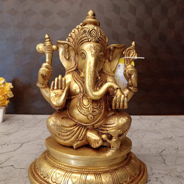 Brass Ganesha Sitting On Round Base